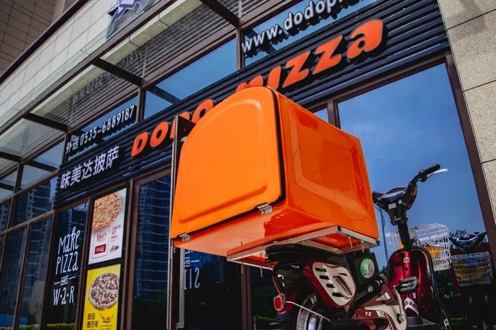 В пасти красного дракона. Чему «Додо Пицца» научилась на китайском рынке